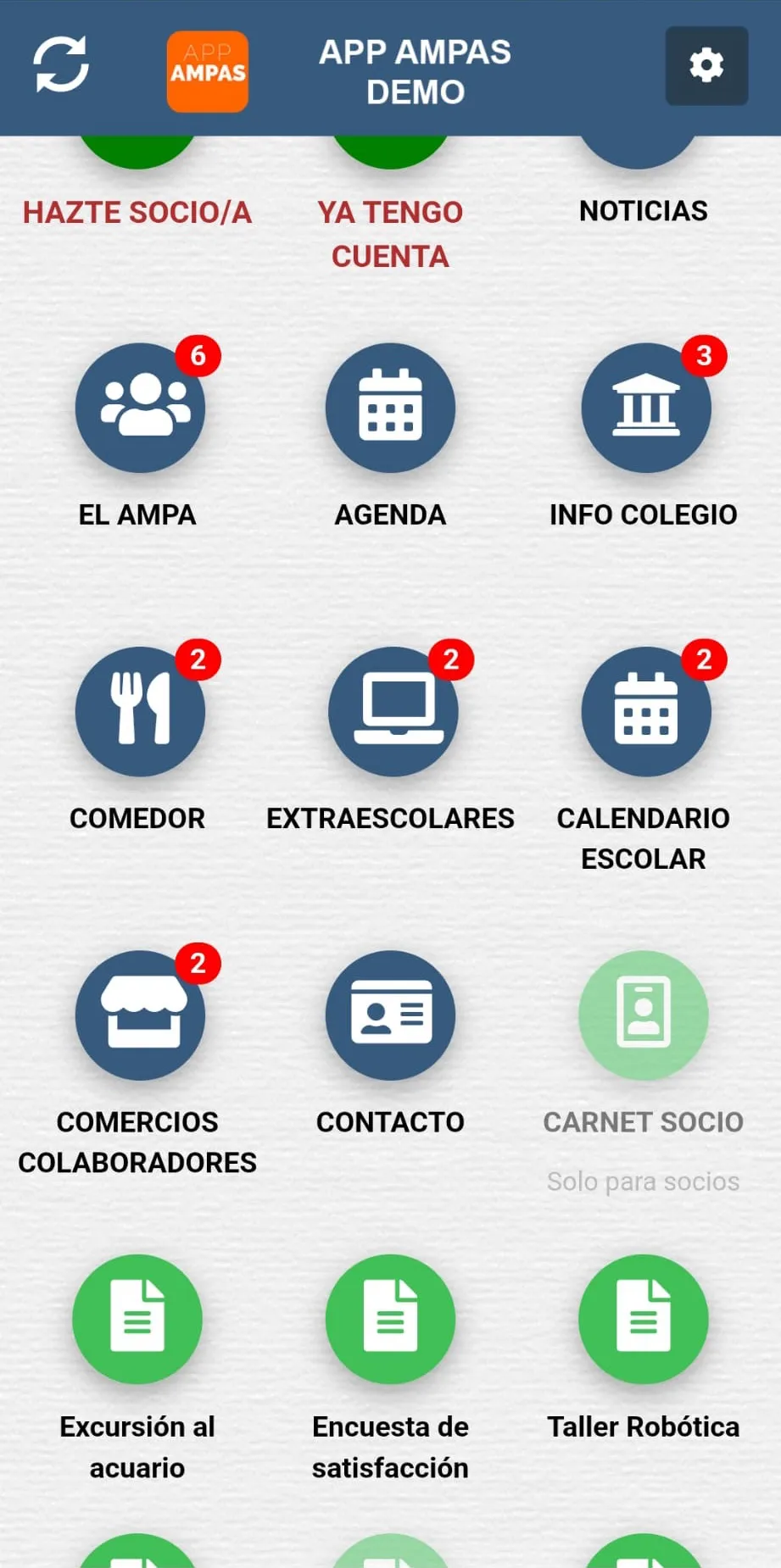 Portada de la App del AMPA en un móvil: la rejilla de iconos redondos azules —El AMPA, Agenda, Info colegio, Comedor, Extraescolares, Calendario escolar, Comercios colaboradores, Contacto y Carné de socio, este último solo para socios— y, debajo, los formularios publicados en verde: Excursión al acuario, Encuesta de satisfacción y Taller Robótica.